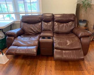 #1	Brown Leather/Pleather Loveseat w/manual Rocker/ Recliner (side button) w/center console w/2 cupholders & Storage Compartment Center - 81" Long	 $300.00 			
