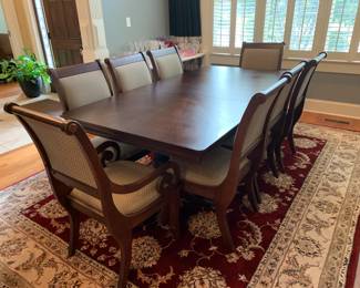 #2 Rectangular Dark Wood Cherry Table w/double Pedistal Legs w/8 chairs (2 captains Chairs) 66-81x44x30 (has table pads) $375.00
#3 Machine Made Burgandy/Cream Floral Motiff- Nourison Brand 8'6" x 11'6" - Wool from New Zealand $400.00