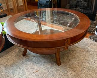 #18 Round Wood Table w/shelf - w/glass Etched top w/wood emblems on side 44x18 $100.00