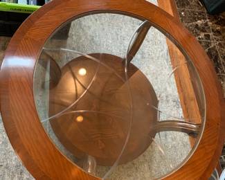 #19 Round Wood End Table w/glass etched top - 28x24 w/wood shelf $75.00
#18 Round Wood Table w/shelf - w/glass Etched top w/wood emblems on side 44x18 $100.00