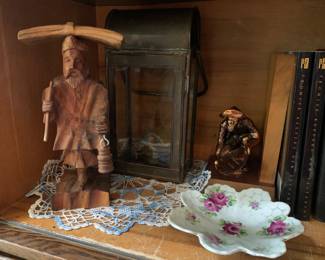 Antique oil light, hand carved figure