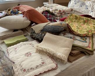 Table cloths, napkins, place mats, bed spreads, pillows and decorative pillows. 