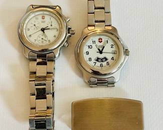 Swiss Army watches and Zippo money clip (lower R)