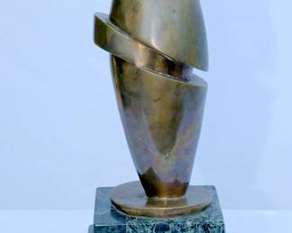 Side view of abstract sculpture by Peter Calaboyias, bronze and marble, titled Psyche No. 2