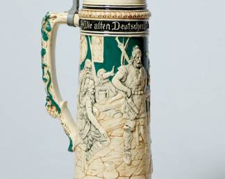 Handle left view of ceramic German beer stein with pewter lid (#1), 2 1/2 Liter, inscription reads, "Die affen Deutschen sie Tranken noch eins , Sie Wohnten am Ufer des Rhien's"
