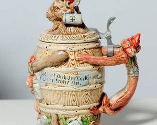 Handle right view of German figural Ram stein (#2) with Monkey handle, inscription reads "Sist Dich der Bock Danntroße Du"