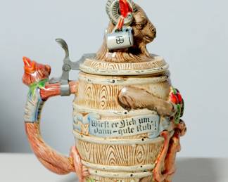 Handle left view of German figural Ram stein (#2) with Monkey handle, inscription reads "Wirft er sich um, Vann - gute Rub"