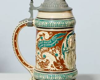 Handle left view of vintage ceramic beer stein with pewter lid (#7), inscription reads "Behut dich Gott Es wor zu schongewesen"