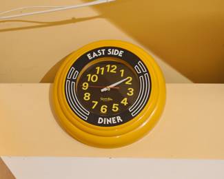 East Side Diner yellow plastic wall clock