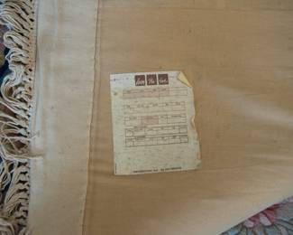 Back detail of Carson Pirie Scott floral design cream, blue, pink, and green rug