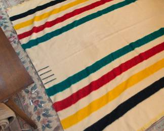 Hudson's Bay Point blanket, cream with black, yellow, red, and green stripes