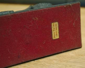 Bottom of bronze Rhinoceros sculpture with Minerva Fine Arts, London, England label on the bottom