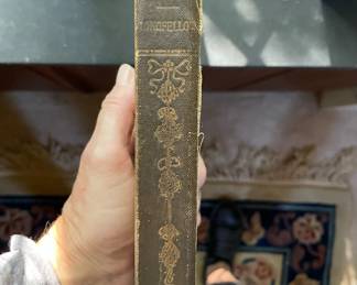 Spine of "Longfellow's Poems: Volume I" by Henry Wadsworth Longfellow. Published by The Riverside Press, Cambridge, Mass. in 1880. Printed by H.O. Hougton & Co.