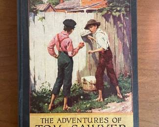 "The Adventures of Tom Sawyer" by Mark Twain. Printed in the United States of America, copyright 1938 by Jane Brehm