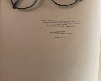 Copyright page of "Longfellow's Poems: Volume I" by Henry Wadsworth Longfellow. Published by The Riverside Press, Cambridge, Mass. in 1880. Printed by H.O. Hougton & Co.
