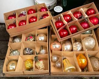 Antique glass Christmas tree ornaments in red, silver, and gold