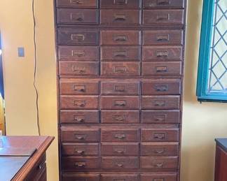 Easy to move five section stacking  barrister style oak letter file with nine drawers per section.  34 1/4" wide x 13" deep x 74 1/2" high