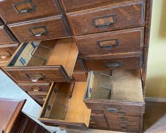 Drawer detail of easy to move five section stacking  barrister style oak letter file with 9 drawers per section.  34 1/4" wide x 13" deep x 74 1/2" high