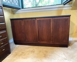 Mid-Century Modern slate top rosewood two door credenza, measuring 48" wide x 16 1/4" deep x 25" high