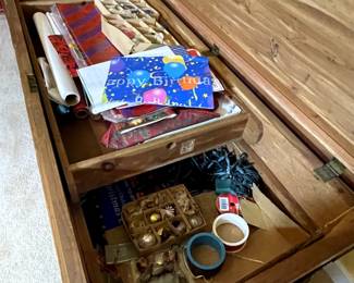 Interior detail with shelf insert of Mid Century Modern cedar chest with decorative brass lock and hinges