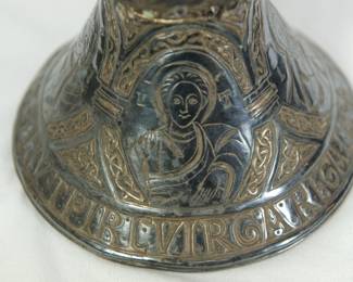 Etching detail of the Replica of The Tassilo Chalice: an 8th century bronze chalice gilded with silver and gold, located in Kremsmuenster Abbey in Austria.
