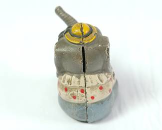 Back view of vintage cast iron elephant bank