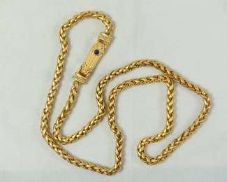 Gold Wheat Chain Necklace with a bar pendant. Bar pendant has rhinestones and Lapis blue stone on one side.