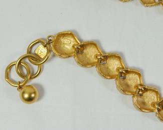 Detail of logo and charm on 1980s Anne Klein statement heart link toggle clasp choker necklace with ©AK mark and logo charm