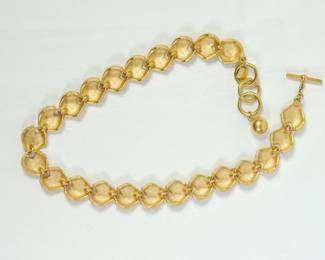 Back view of 1980s Anne Klein statement heart link toggle clasp choker necklace with ©AK mark and logo charm