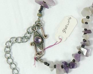 Detail of sterling silver clasp on Hematite and rough cut Amethyst necklace with a rose-shaped Amethyst pendant and a sterling silver clasp