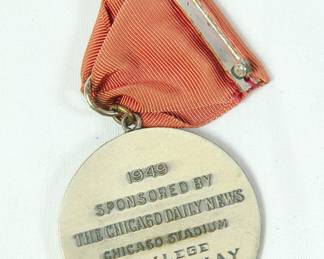 Back view of 1949 Chicago Stadium College Medley Relay, 2nd Place medal. Sponsored by The Chicago Daily News. Sterling Silver