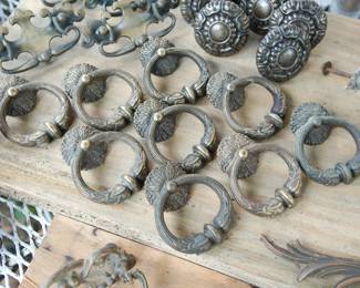 Set of antique brass hardware handles, center screw with drop handle