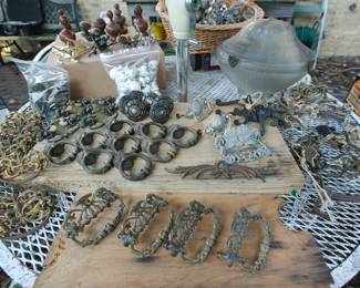 A stunning collection of vintage decorative cabinetry hardware: hooks, drawer pulls, handles, doorknobs, etc!