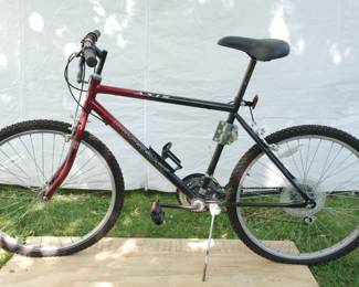 Other side of red and black Axis Murray men's bicycle, Index 21 Speed, made in the USA