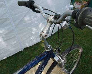 Handle detail of Trek 7300 20" blue men's bicycle, Made in the USA with luggage rack