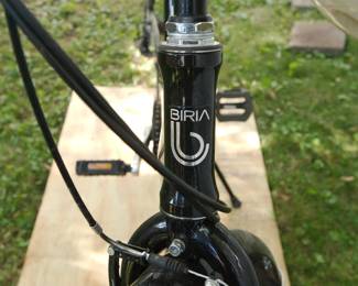 Front detail of Black Biria Easy Boarding bicycle with luggage rack and bike bag, 46cm, designed in Germany
