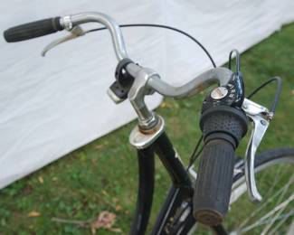 Handlebar detail of Black Cocoa Trek step-through bicycle