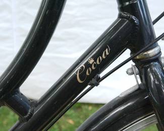 Logo detail of Black Cocoa Trek step-through bicycle