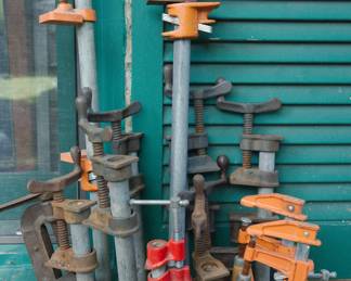 Detail of Assorted bar clamps and pipe clamps, carpentry equipment
