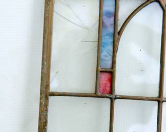 Detail of a series of cracks near the top left of the right of first Prairie School style stained glass window panel: clear glass with amber, gold, green, blue and red details, each panel measuring 10 3/8" wide x 20 3/8" high