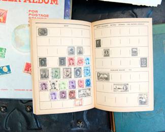 Inside detail of  "The Adventurer Stamp Album" with stamps