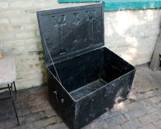 Inside view of antique Arts & Crafts metal firewood box