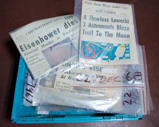 More of an extensive collection of notable historic newspapers including Chicago Sun Times, December 22, 1968, "A Flawless Launch! 3 Astronauts Blaze Trail to the Moon" and Chicago Daily News, March 28, 1969, "Eisenhower Dies: Funeral Monday in Washington"