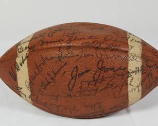 Side view of Football signed by the Chicago Bears team, late 1960’s, probably 1969. Signed by Bobby Joe Green, Mac Percival, Mike Pyle, Frank Cornish, Jack Concannon, Dick Evey, Ralph Kurek, Dick Butkiss, and possibly Gale Sayers