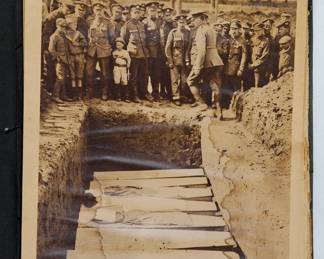 Interior page of "RAW WAR: The Uncensored Story of the World War in Photogravure" published by The Chicago Daily News. Saturday, February 17, 1934.