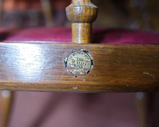 Detail of on the the set of four chairs by The Buckstaff Co. Oshkosh, Wis. The Quality Kind.' ChairThis company was in business from 1882 through 2007 and was known for their high-quality resilient products - their furniture was seen as an investment. (The Buckstaff Furniture Company outfitted the US Pentagon's restaurant in a 1958 remodel.)