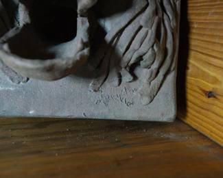 Detail of a very cool lion clay relief tile sculpture, signed Laughlin and dated 1962. Possibly by sculptor John Laughlin.