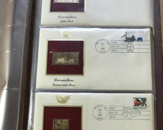 Interior page of "Golden Replicas of United States Stamps" proof replicas on a gleaming surface of 22kt gold