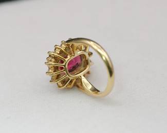 Interior detail of the setting of 18K yellow gold ring with 1 carat single cut diamonds and an approximately 6.5 carat tourmaline, size 6