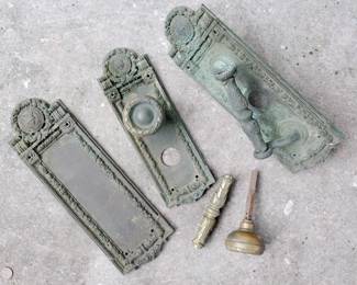 All three types of hardware from antique bronze door hardware from a Cook County building, Seal of Cook County on the plates